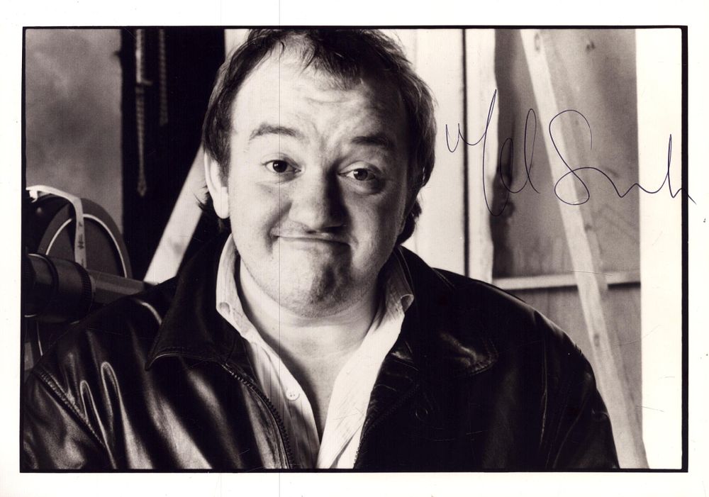 Lot 249: Mel Smith signed photo card, black and white,...