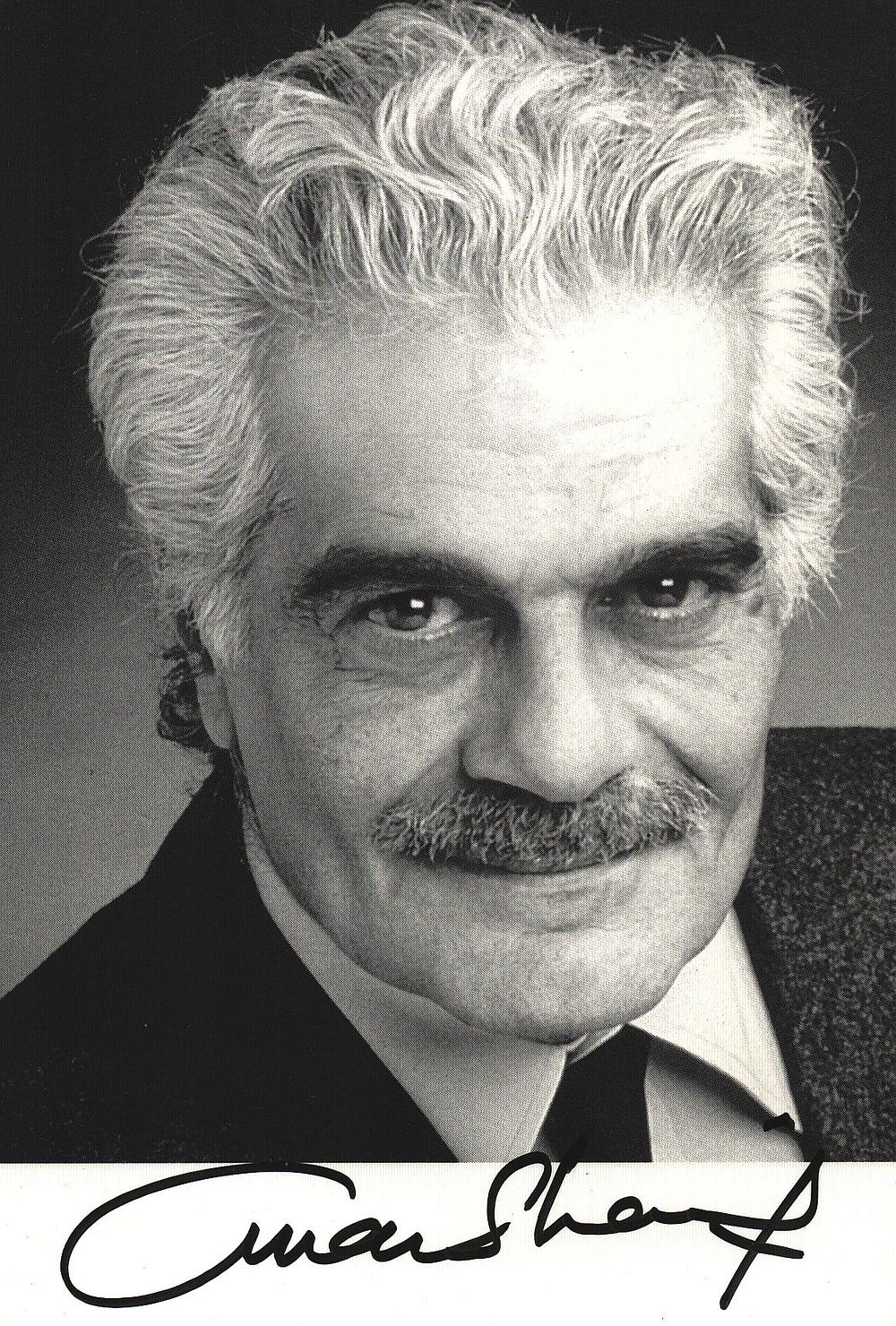 Lot 375: Omar Sharif signed 6x4 inch black & white...