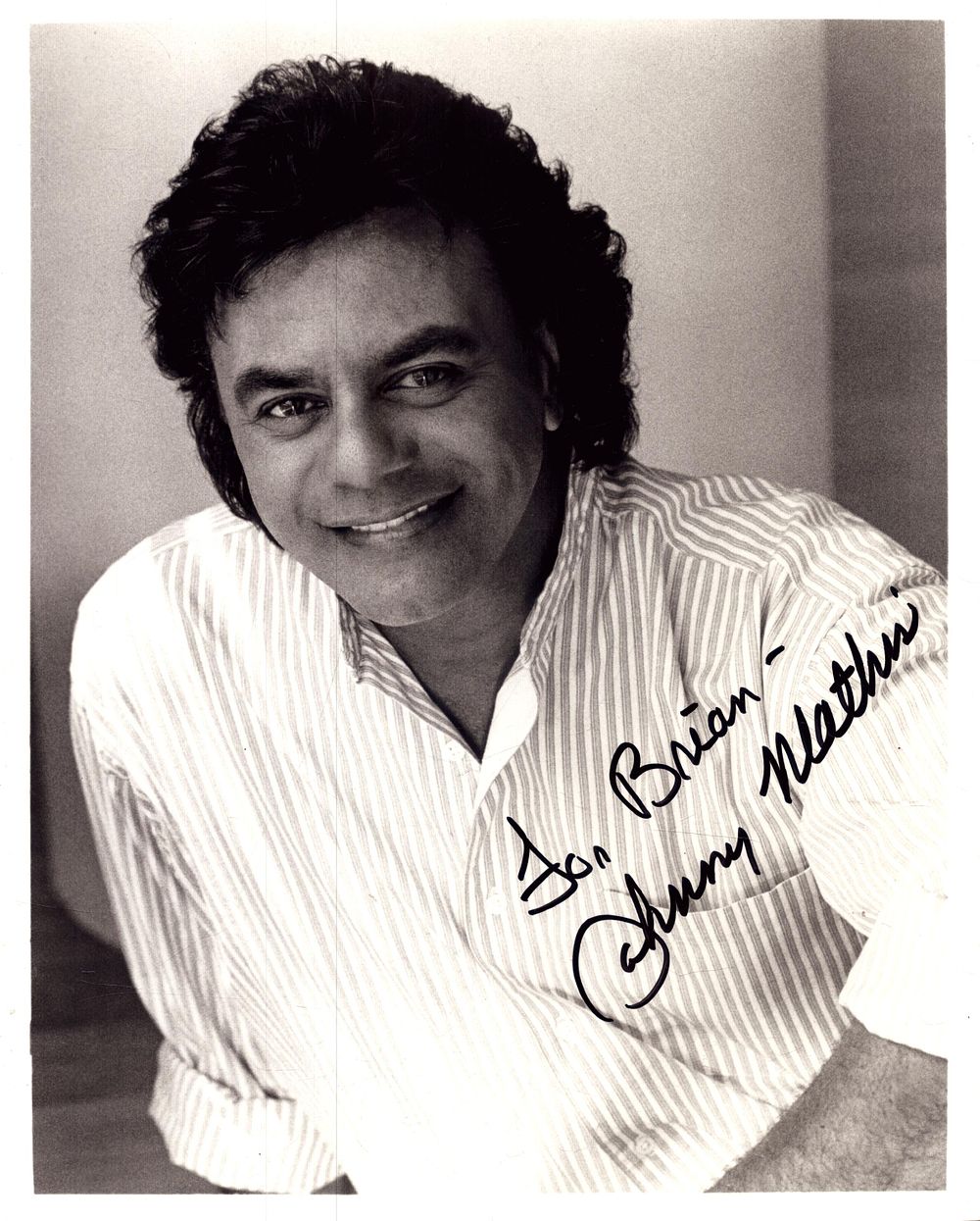 Lot 612: JOHNNY MATHIS Singer signed 8x10 Photo.