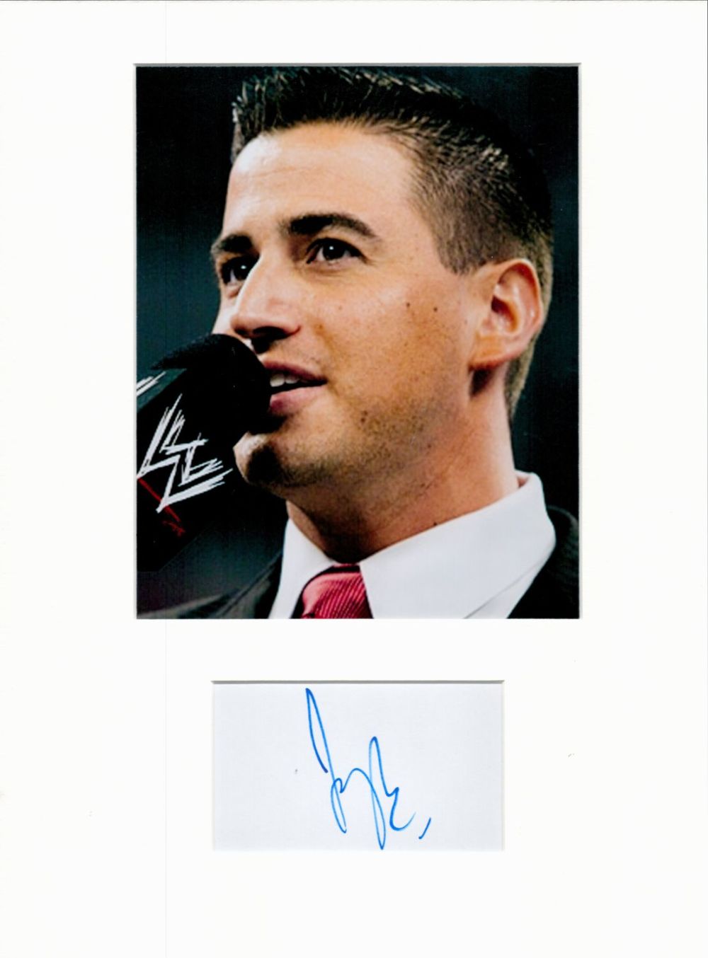 Lot 328: Justin Roberts WWE 16x12 overall mounted signature piece....