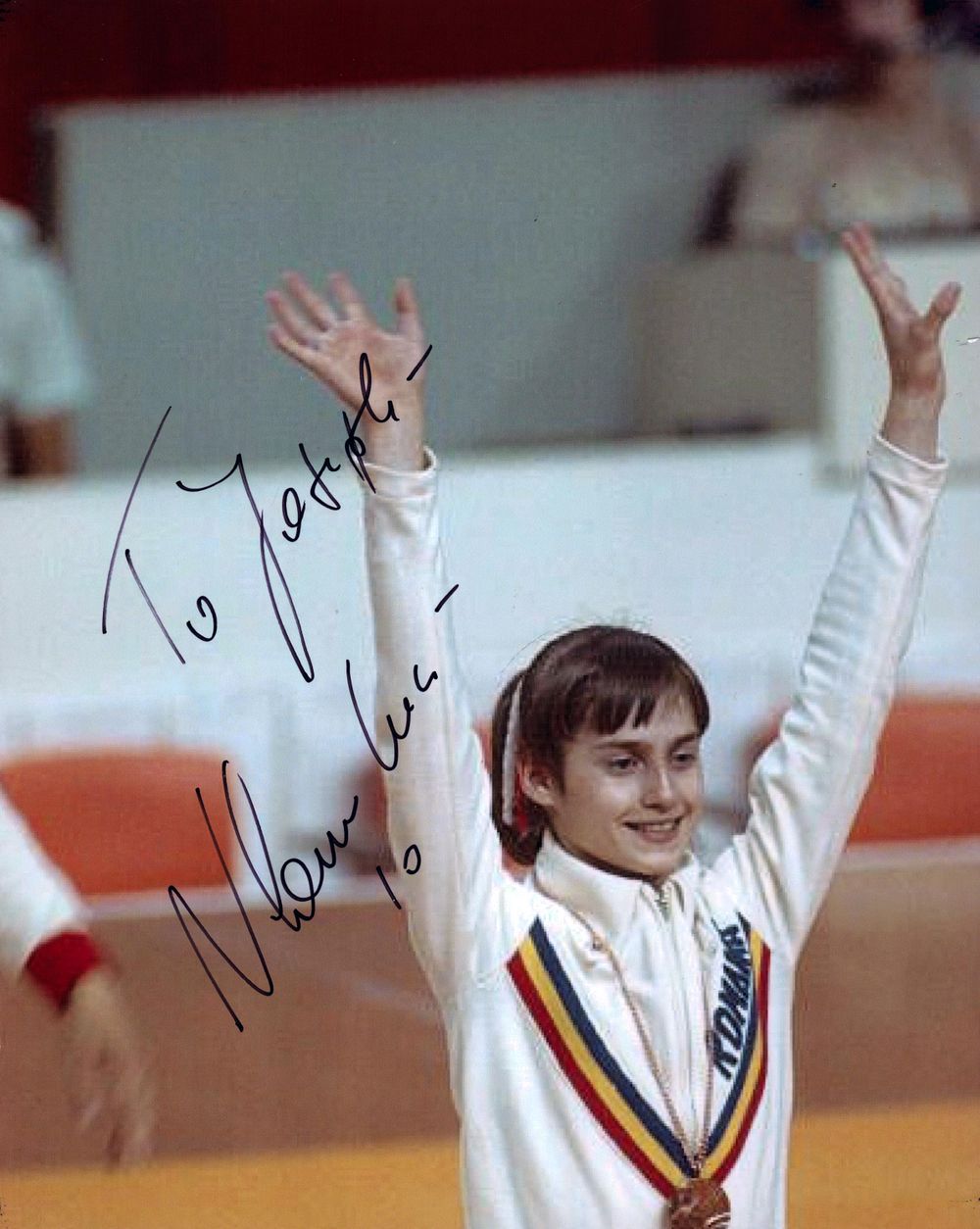 Lot 253: Nadia Comaneci signed 10x8inch colour photo.