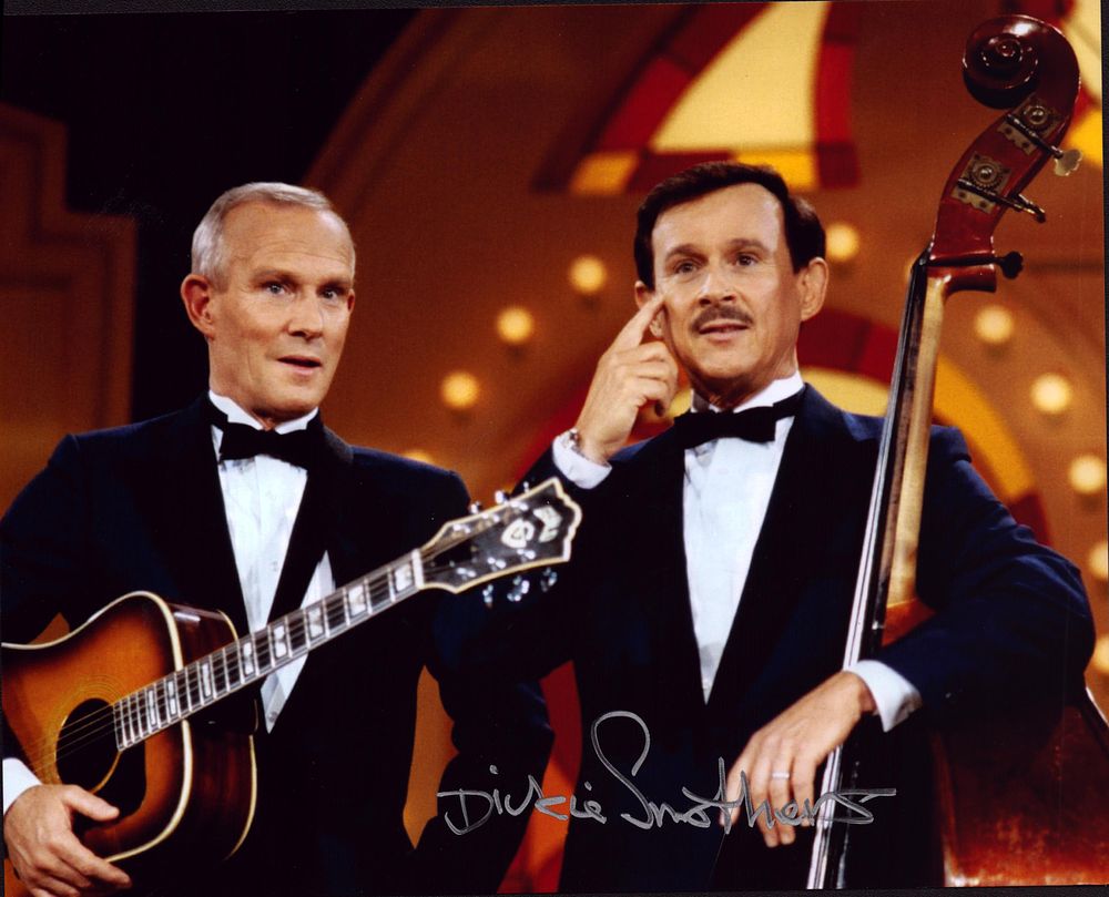 Lot 255: Dick Smothers signed 10x8inch colour photo.