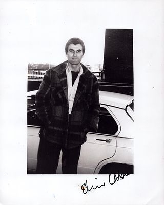 Oliver Cotton signed 10x8 black & white photo. Some discolouration to signature possibly due to 