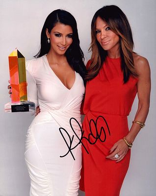 Kim Kardashian signed 10x8 colour photo pictured with another woman.