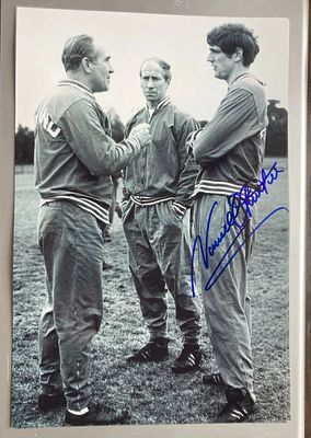 Norman Hunter 1966 World Cup signed 12 x 8 inch b/w photo with Sir Alf Ramsey and Bobby 