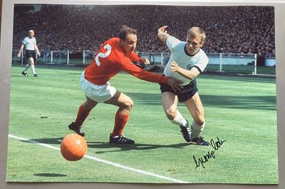 George Cohen 1966 World Cup football hero signed 12 x 8 inch colour action photo. Single Vendor 