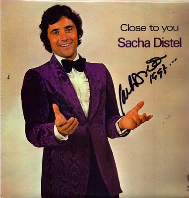 Sacha Distel signed 12inch vinyl cover.