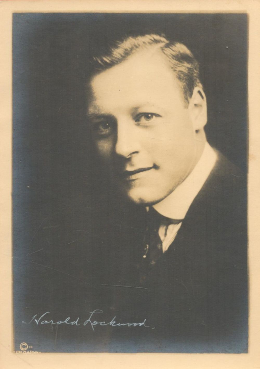 Lot 35: Harold Lockwood signed 7x5 vintage sepia photo slight...