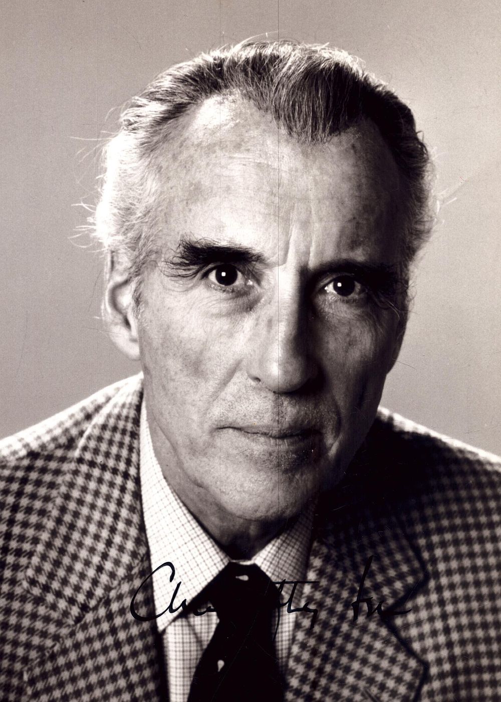 Lot 183: Christopher Lee signed 7x5 inch black and white...