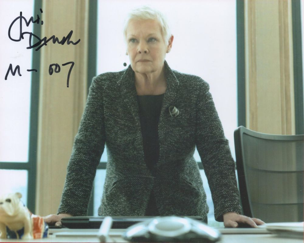 Lot 70: Judi Dench signed 10x8 James Bond colour photo...