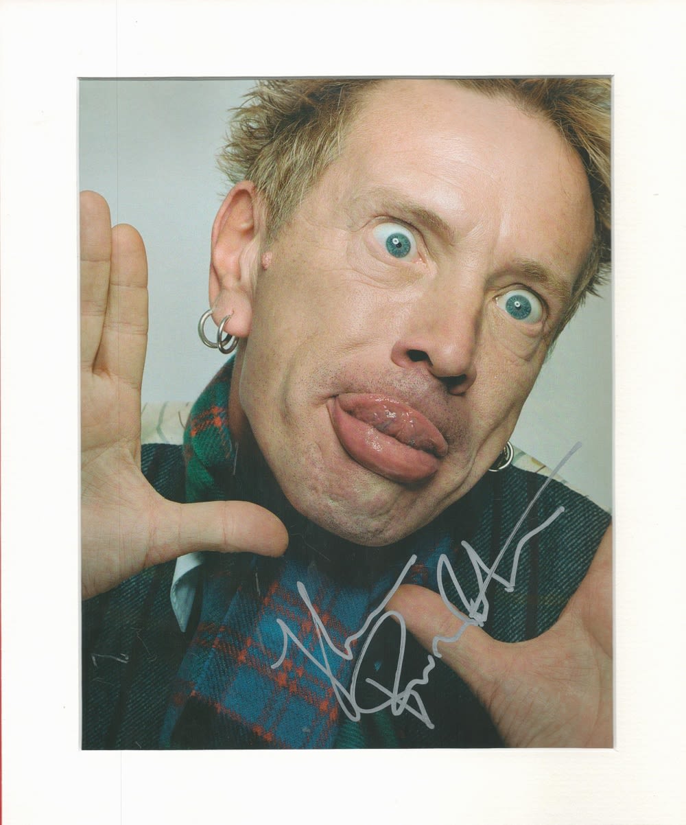 Lot 79: John Lydon signed 12x10 overall mounted colour magazine...