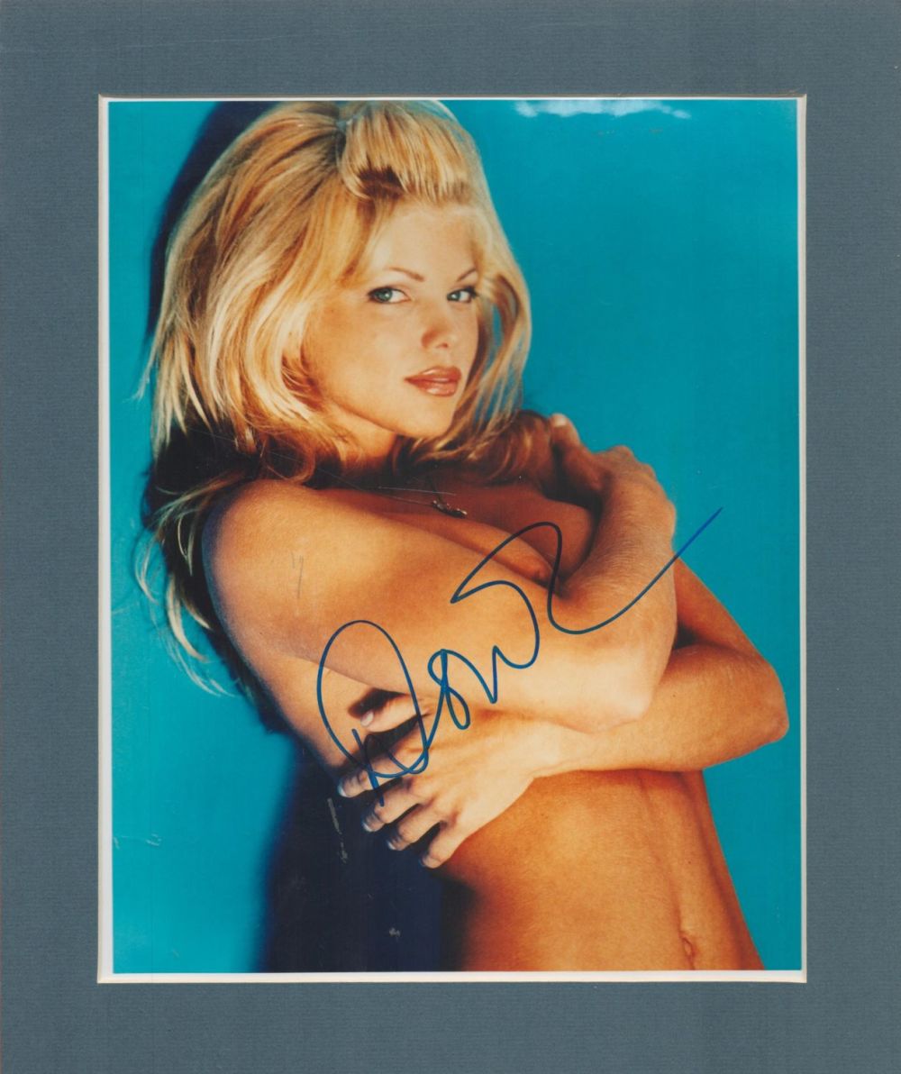 Lot 88: Donna D'Errico signed 10x8 overall mounted colour photo....