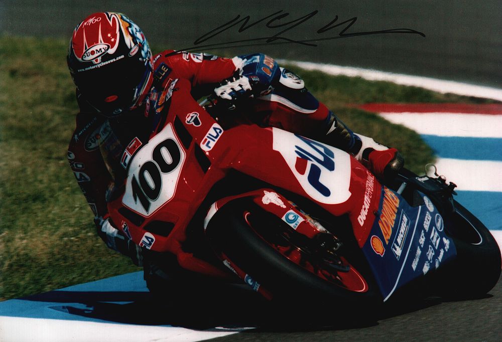 Lot 152: Neil Hodgson signed 12x8 colour photo. Is a...
