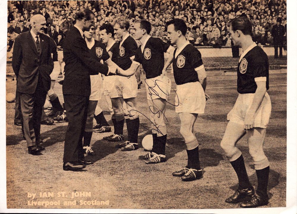 Lot 332: Ian St. John signed black and white photo...