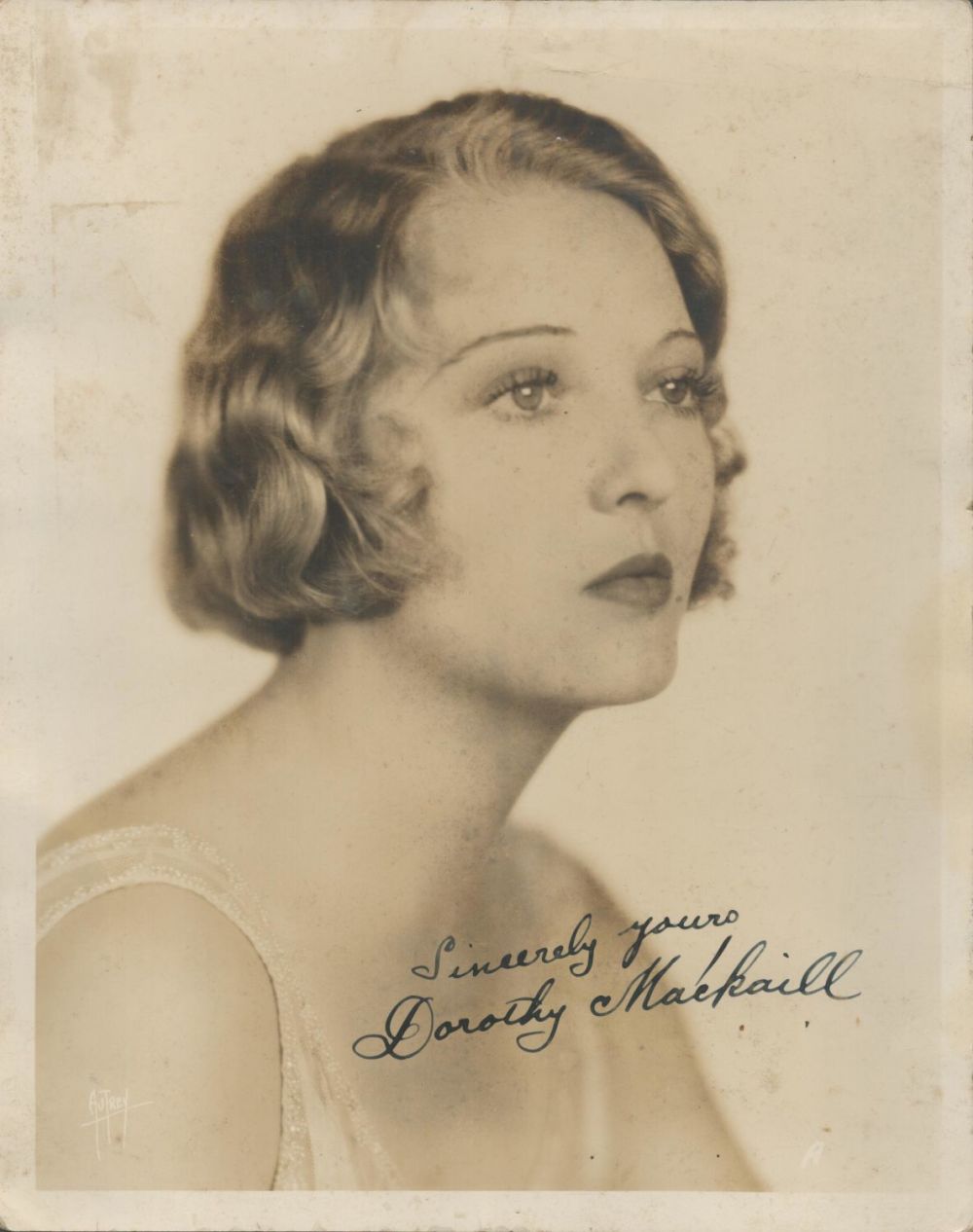 Lot 210: Dorothy Mackail signed 10x8 vintage black and white...
