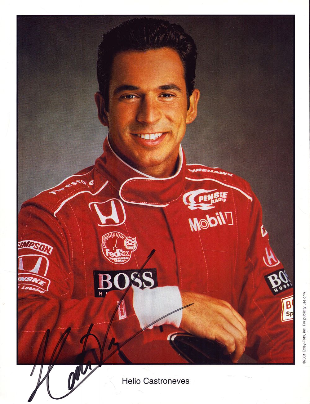 Lot 447: Helio Castroneves headshot image, approx 11x8.