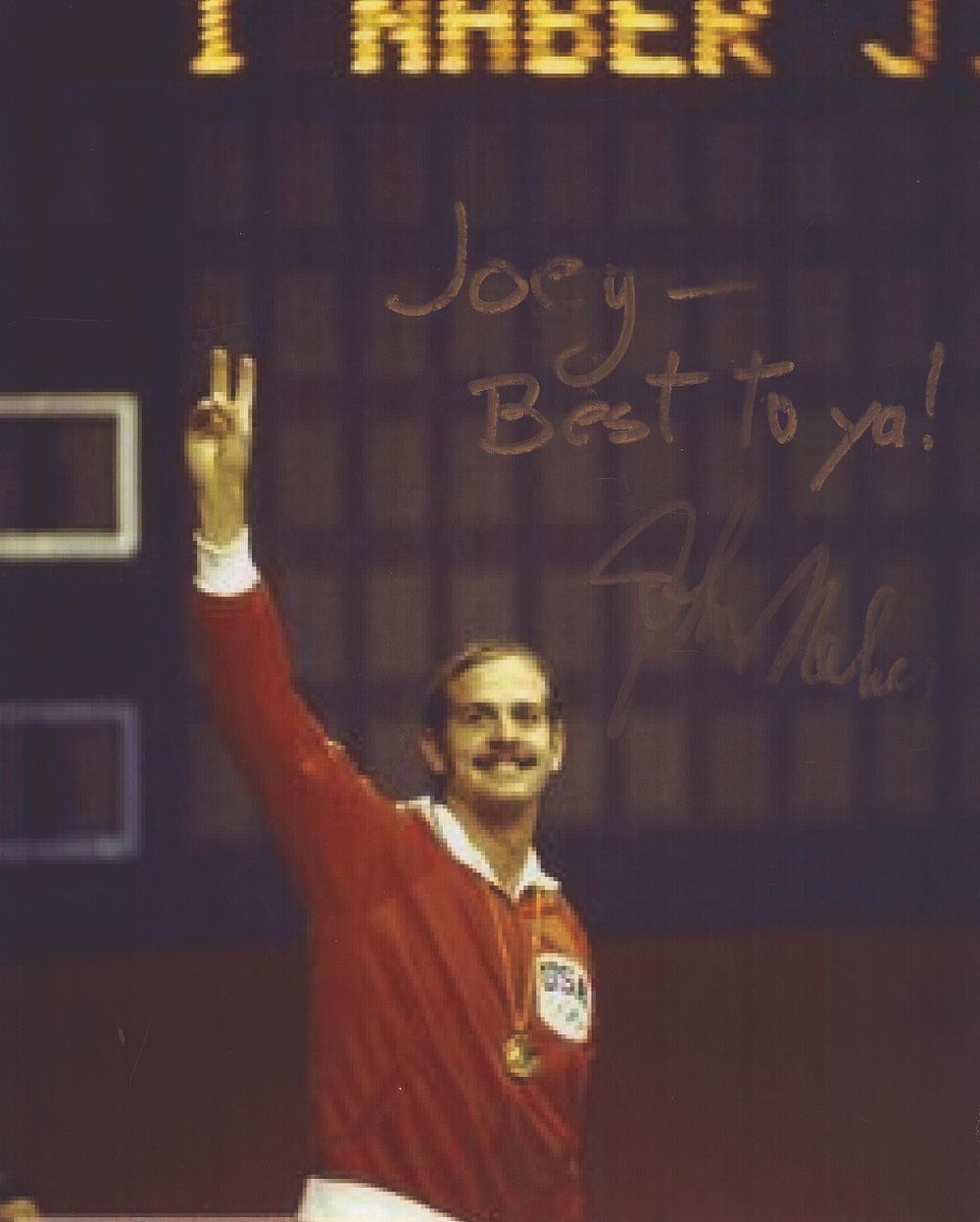 Lot 553: John Naber signed 10x8inch colour photo. Dedicated. Good...