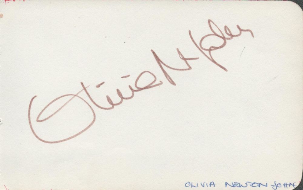 Lot 227: Olivia Newton John signed 6x4 white card. Good...