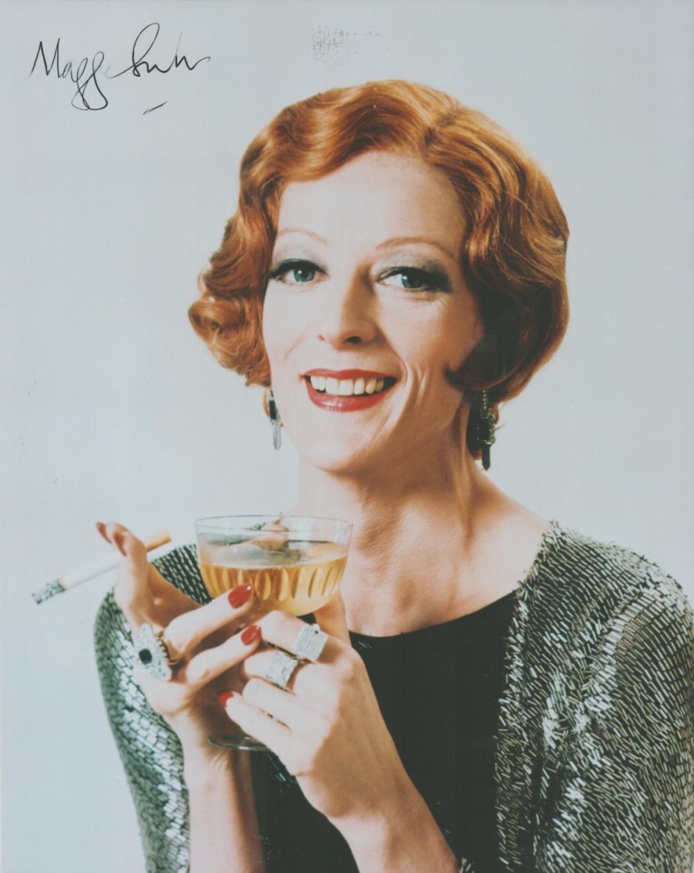 Lot 238: Maggie Smith signed 10x8 colour photo. Good condition....