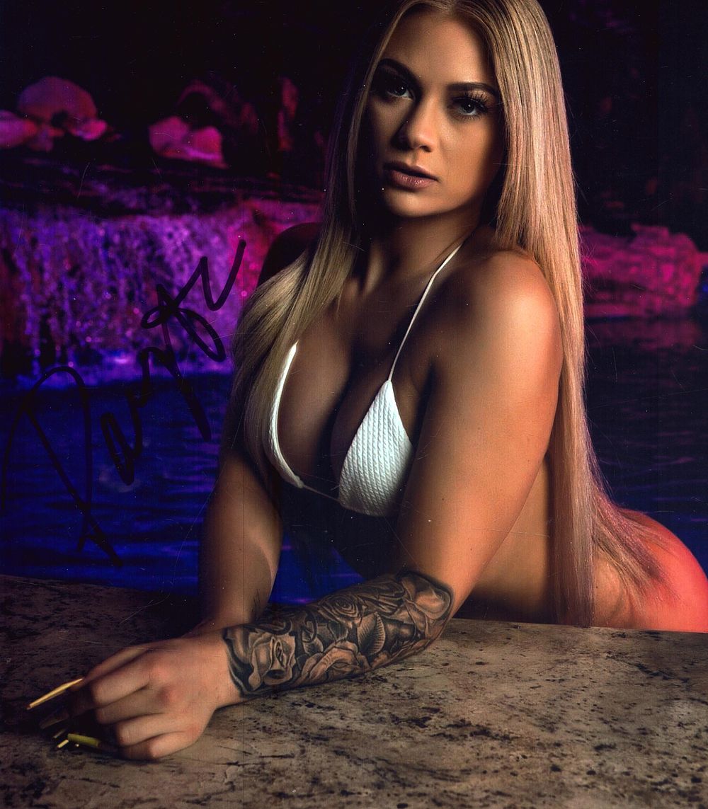 Lot 154: Payton Ashley signed coloured risqué photo, approx. 10x8.
