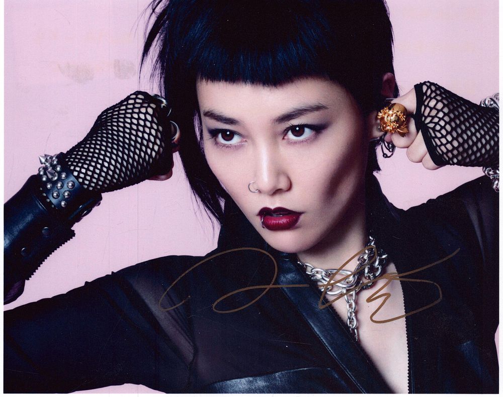 Lot 168: Rinko Kikuchi signed coloured photo, approx. 10x8.