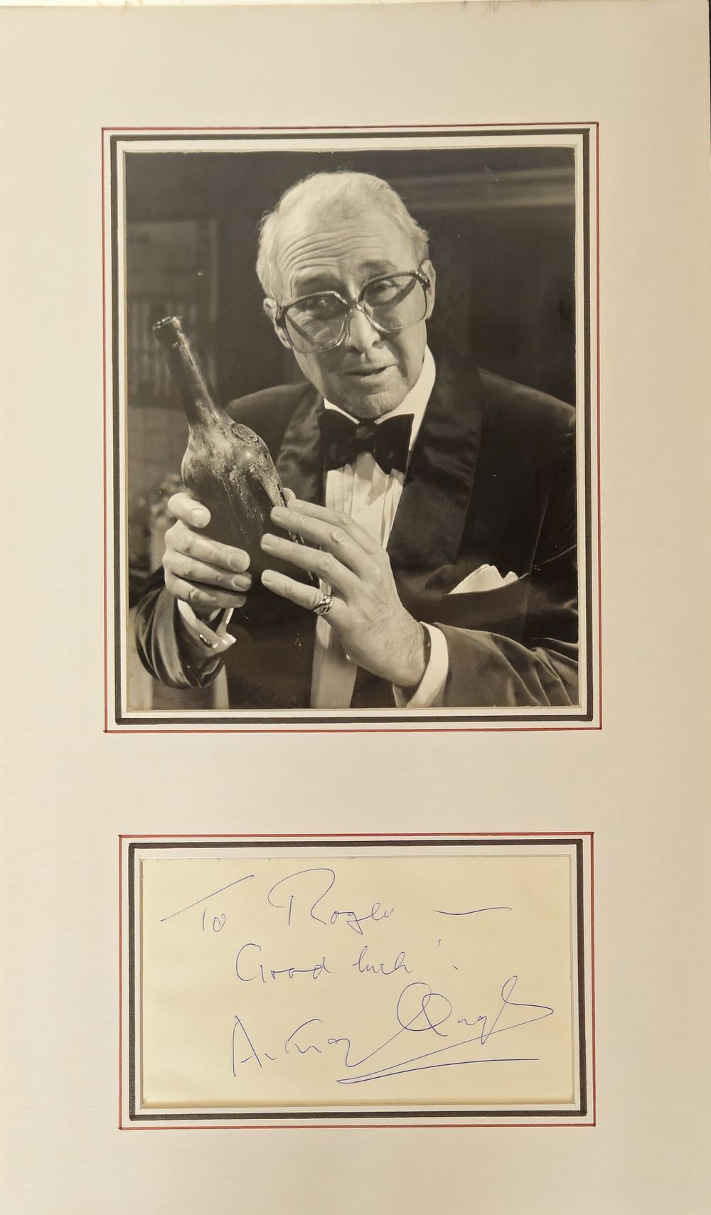 Lot 479: Anthony Quayle signature piece mounted below black and...