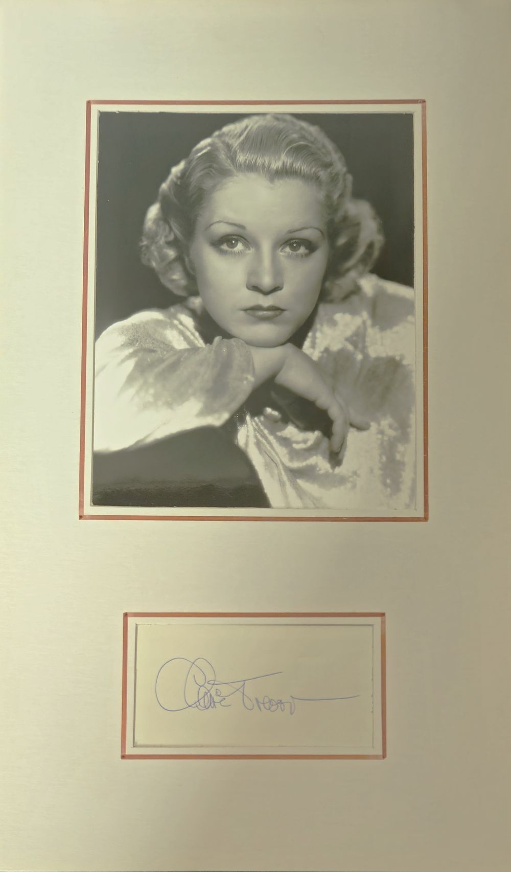 Lot 487: Claire Trevor signature piece mounted below black and...