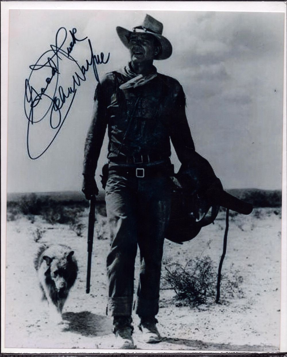 Lot 511: John Wayne signed 10x8inch black and white photo.
