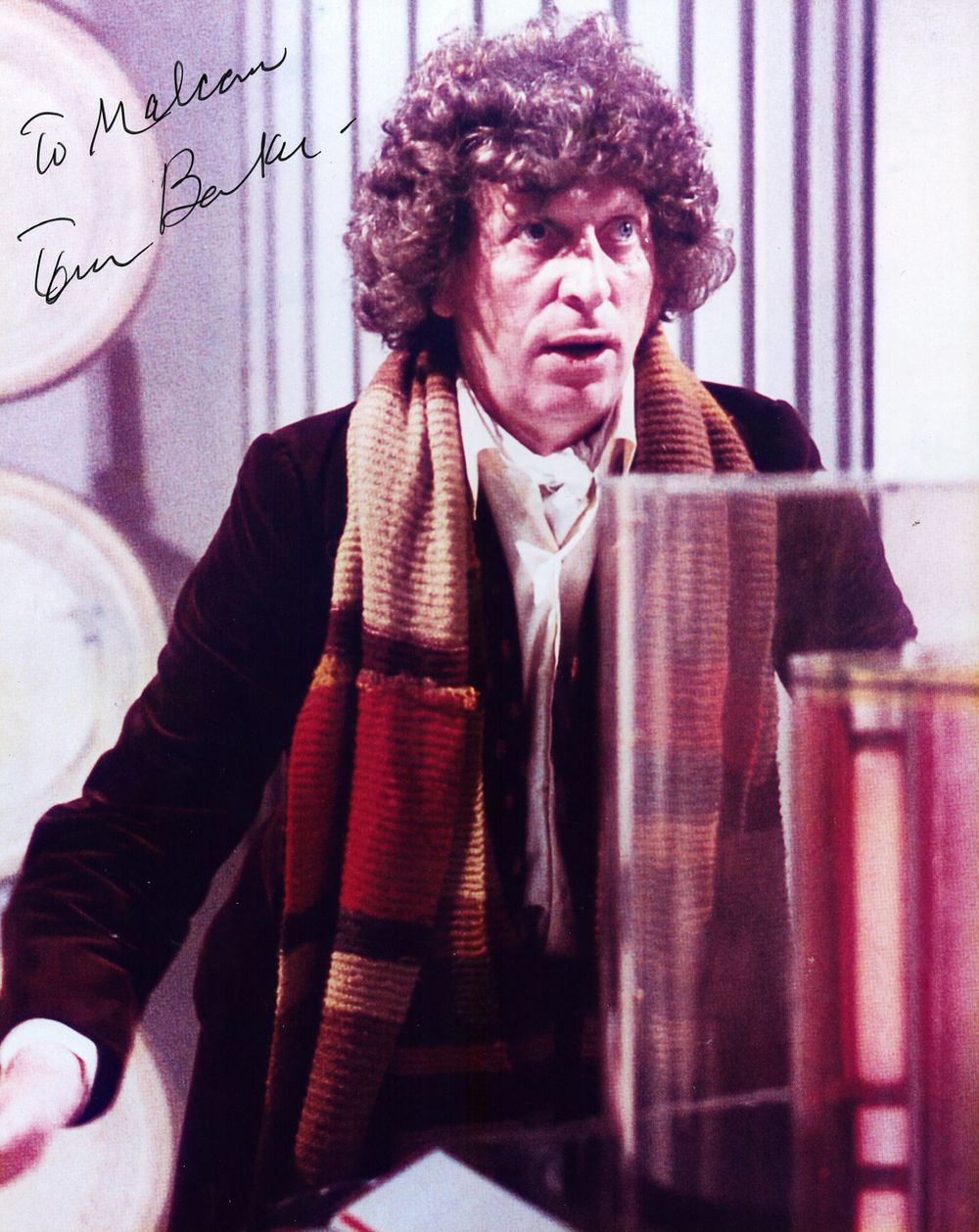 Lot 552: Tom Baker signed 10x8inch Dr Who colour photo....