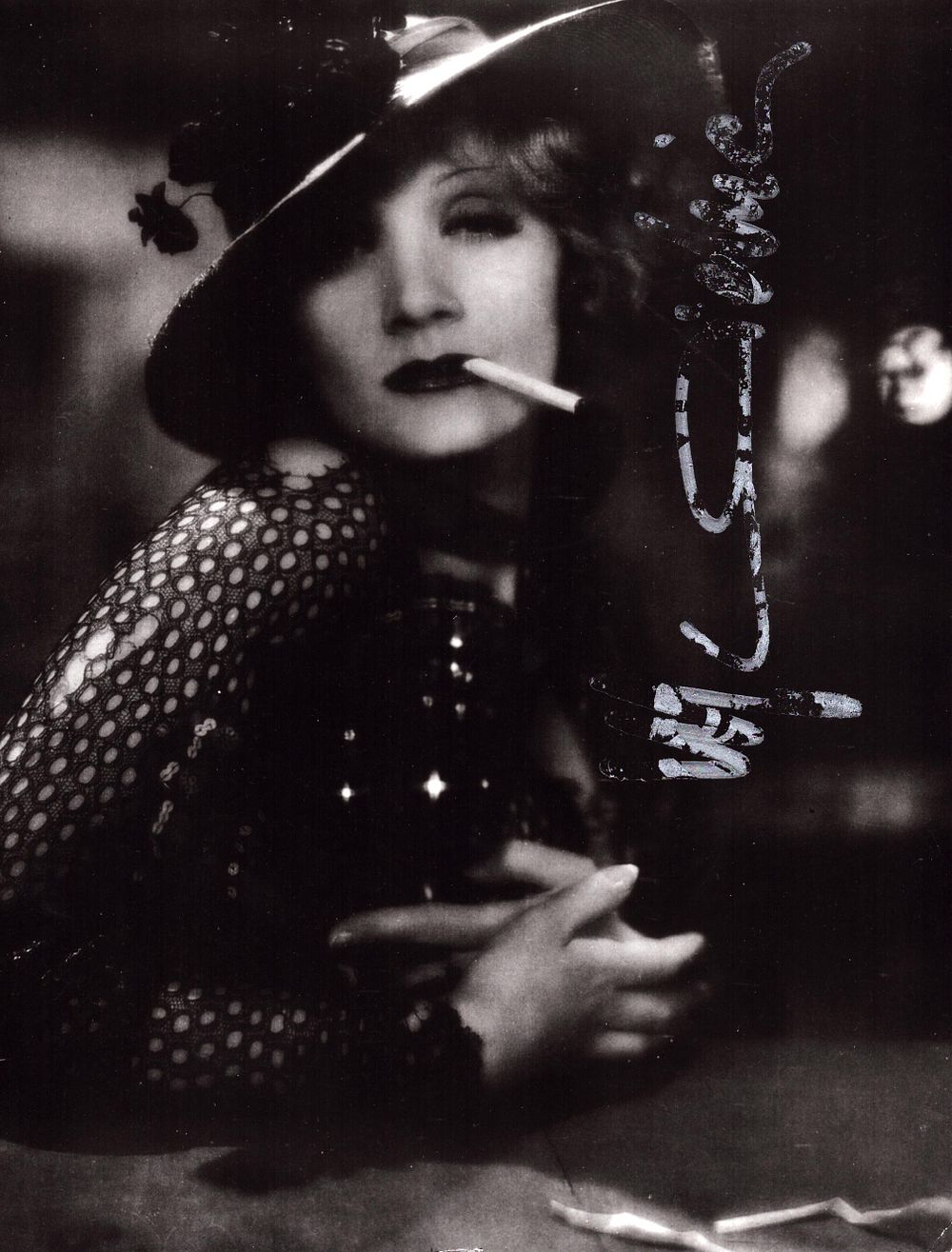 Lot 553: Marlene Dietrich signed 9x7inch black and white photo....