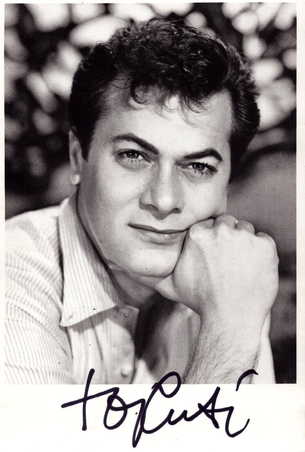 Lot 571: Tony Curtis signed 7x5inch black and white photo.