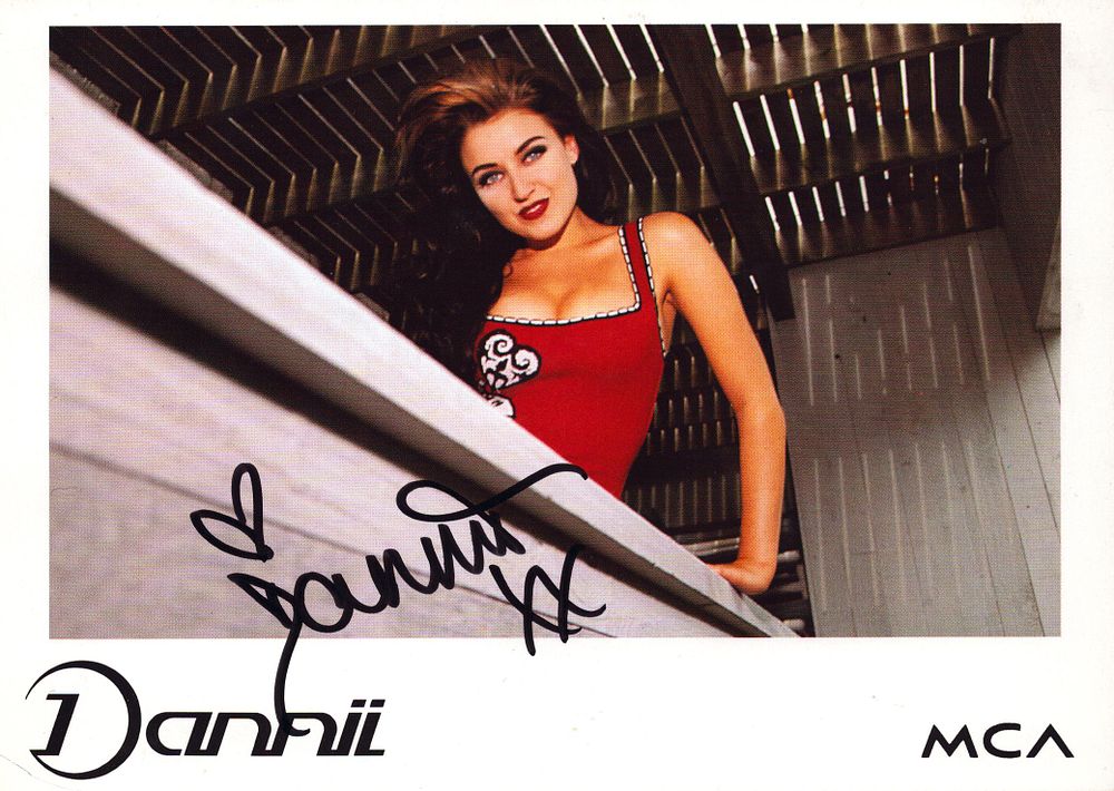 Lot 580: Dannii Minogue signed 7x5inch colour promo photo.
