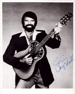 Glen Campbell signed 10x8inch black and white photo.