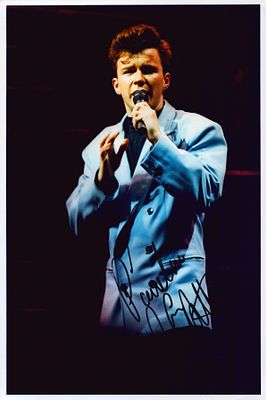 Rick Astley signed 12x8inch colour photo.