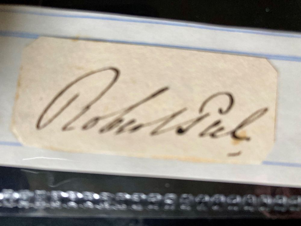 Lot 250: Robert Peel Prime Minister signed 3x2inch page cutting....
