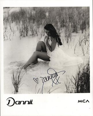 Dannii Minogue signed 10x8inch black and white promo photo.