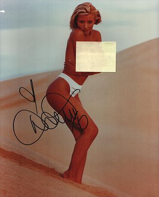 Dannii Minogue signed 10x8inch risqu&eacute; colour photo.