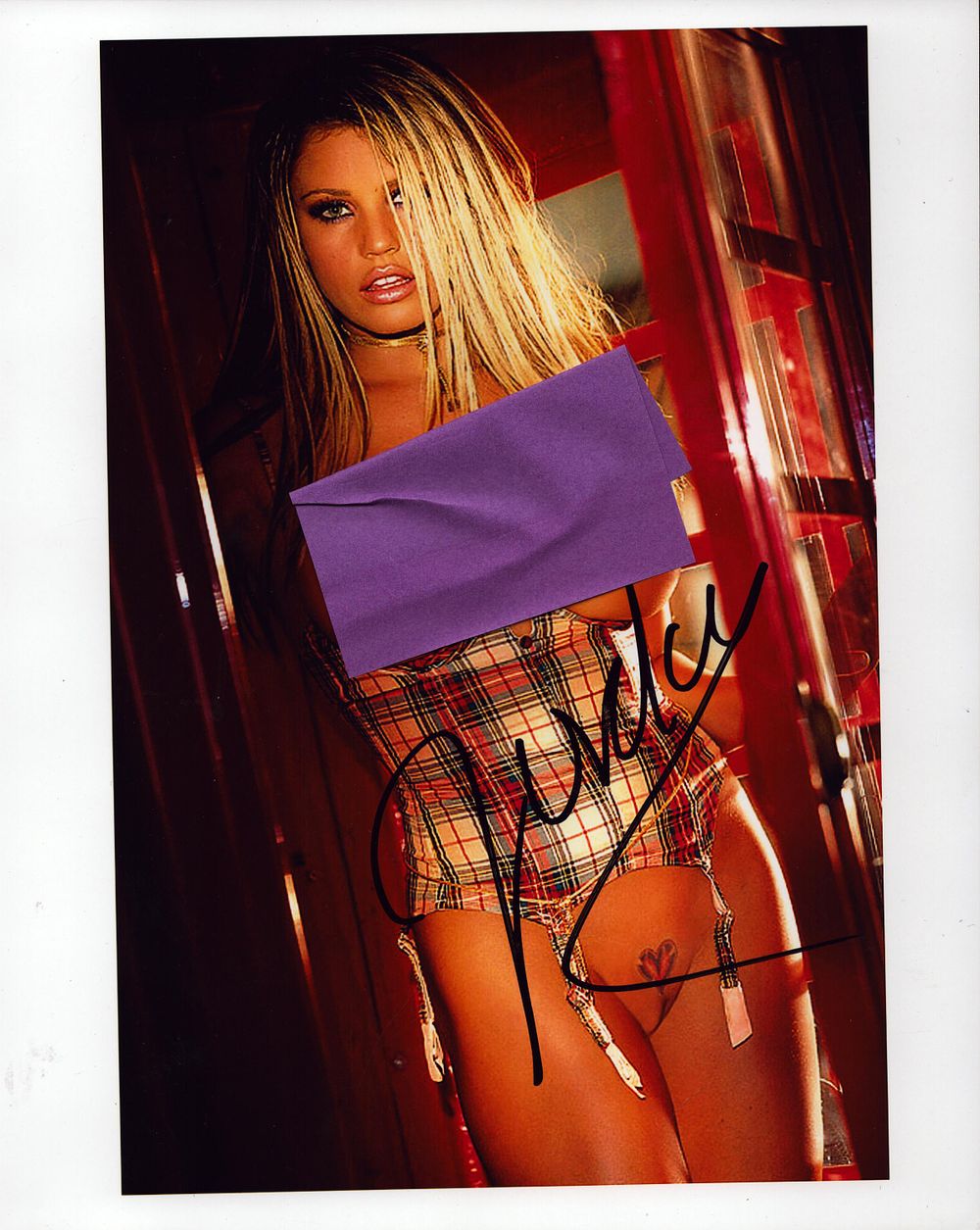Lot 544: Katie Price risqué signed 10x8 inch colour photo.