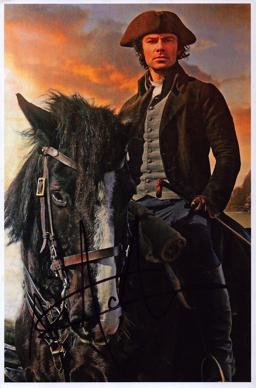 Lot 568: Aidan Turner signed 12x8 inch colour photo.