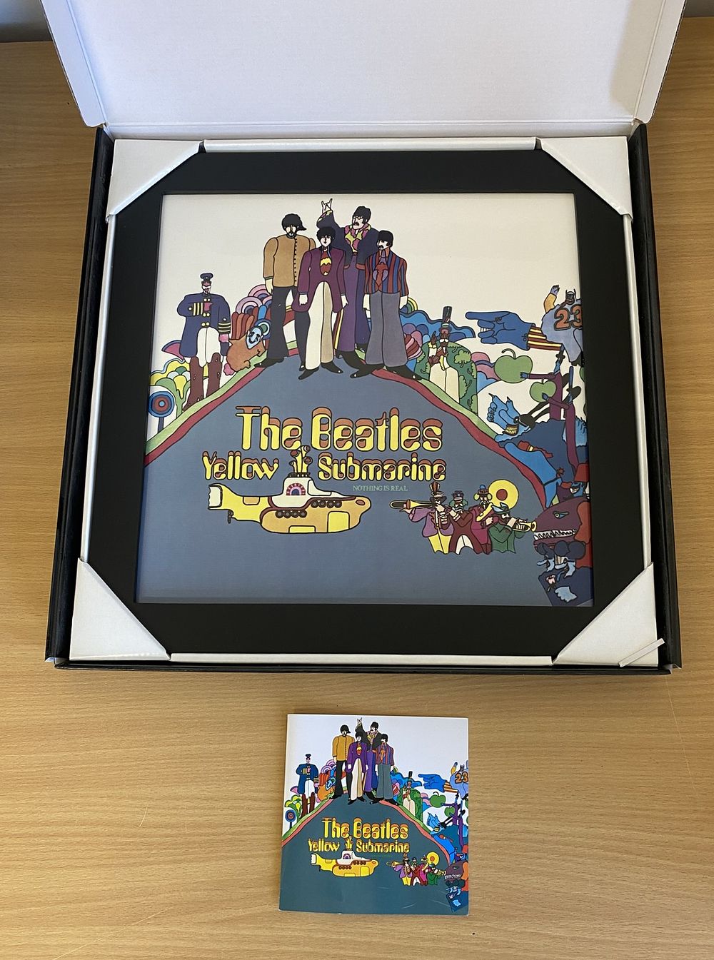 Lot 305: The Beatles framed image of Yellow Submarine ,...