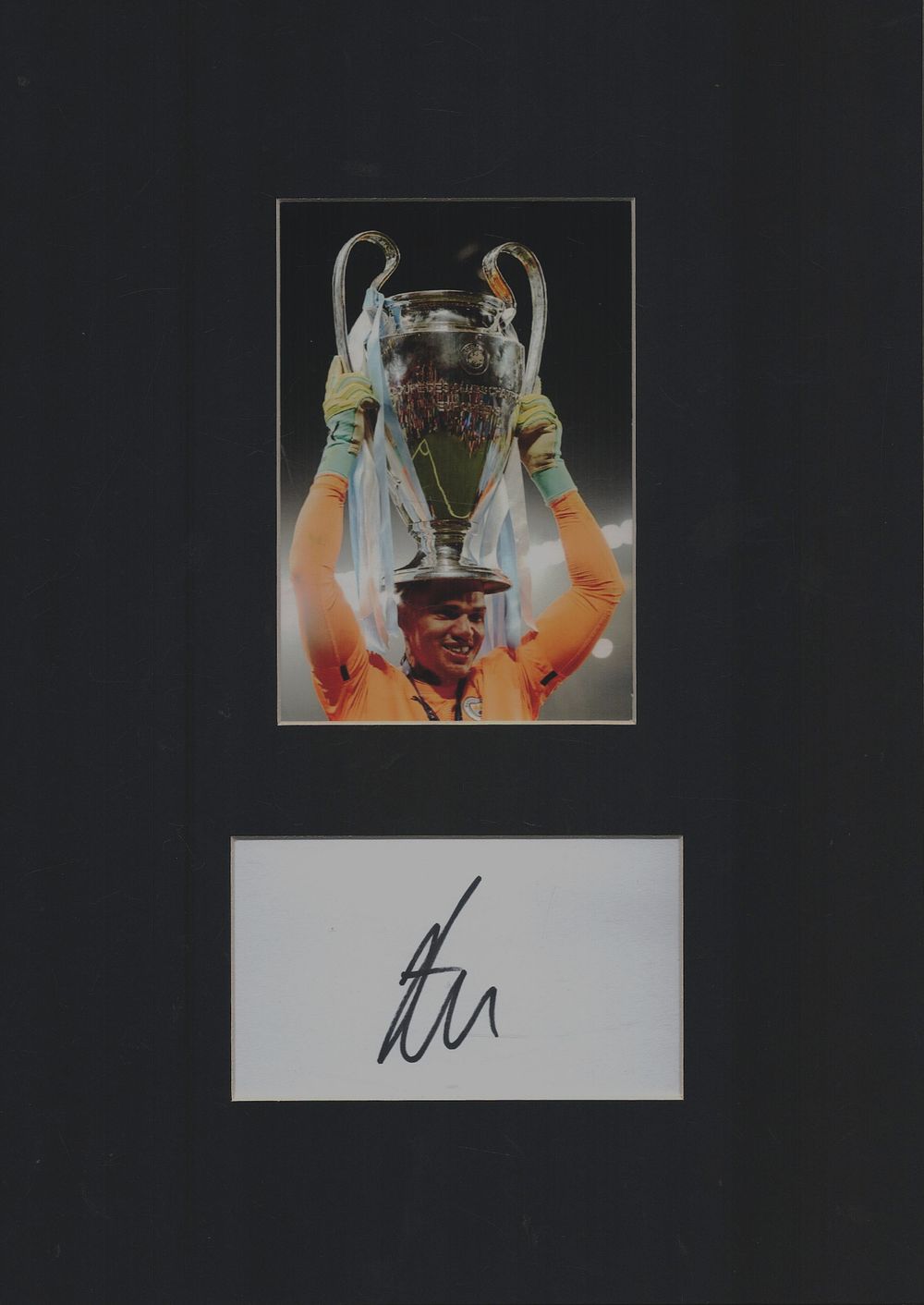 Lot 459: Ederson signature piece mounted below colour photo. Approx...