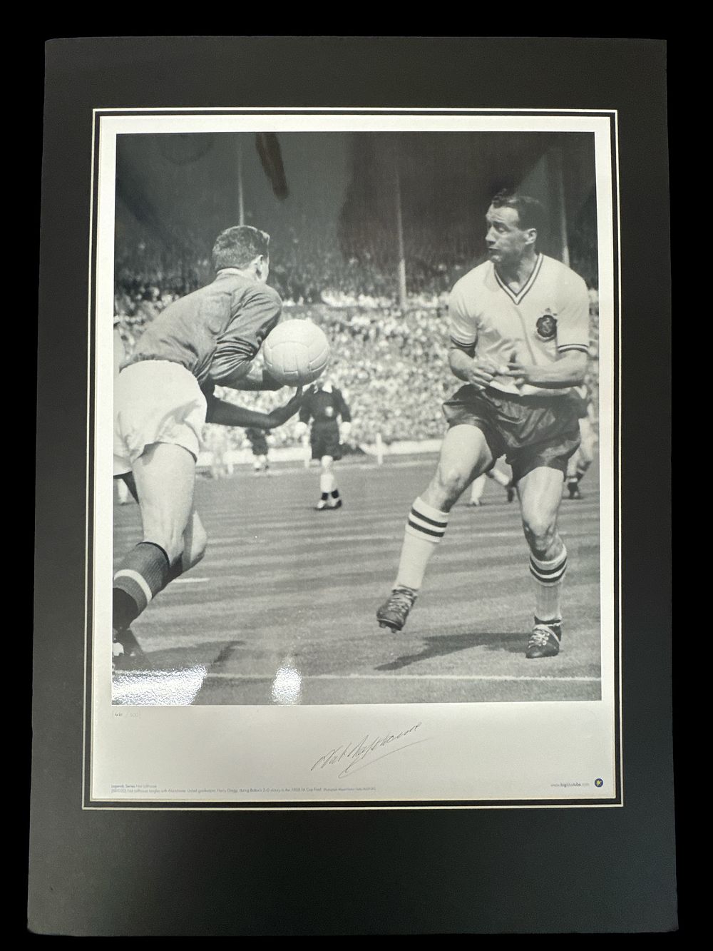 Lot 496: Nat Lofthouse signed black and white photo. Mounted...