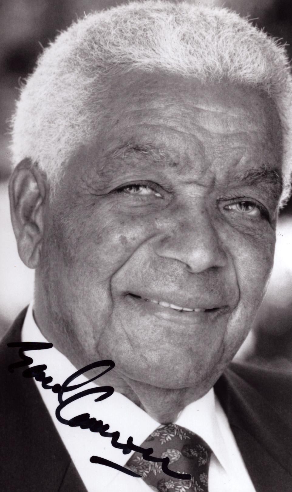 Lot 312: Earl Cameron signed 5.5x3.5 inch black & white...