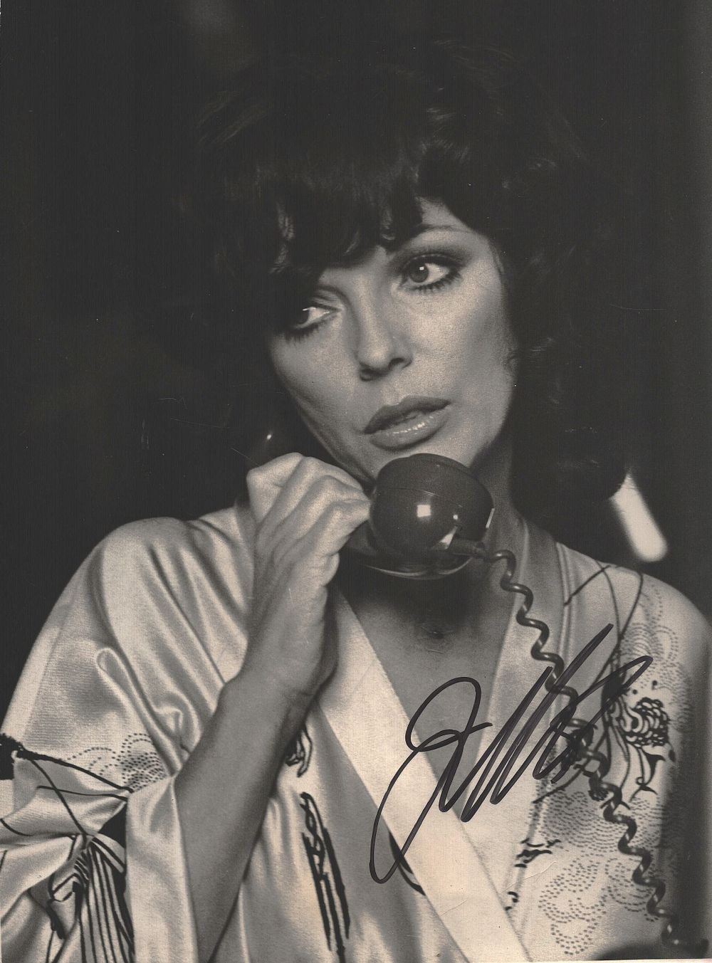 Lot 357: Joan Collins signed 10x8inch black and white photo.