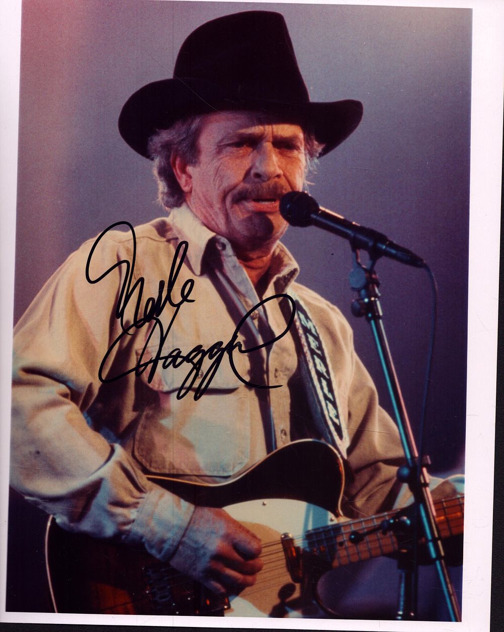 Lot 180: Merle Haggard signed 10x8inch colour photo.