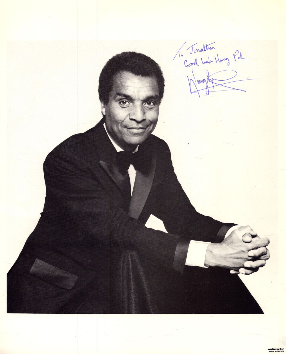 Lot 212: Kenny Lynch signed 10x8inch black and white photo....