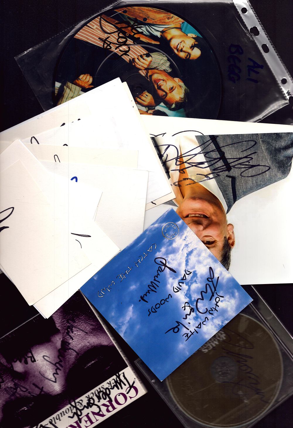 Lot 260: Mcusic collection includes signed cd sleeves, discs and...