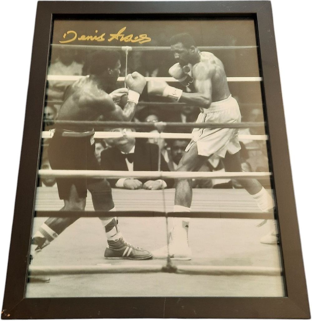 Lot 520: Dennis Andries signed 16x12inch framed and mounted black...