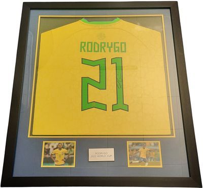 Lot 526: Rodrygo signed replica Brazil shirt. Framed and mounted...