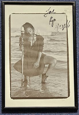 Lot 589: Kym Mazelle signed on the glass of a...